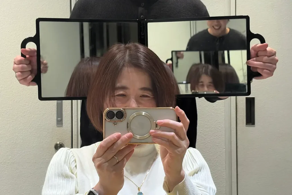 2回目の施術後。ブリーチを最小限に抑えつつ、カラー剤の限界まで明るくした、透明感のあるブラウン。